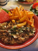 Gyrospfanne Mit Frischen Champions In Sahnesoße Mit Pommes Frites Und Krautsalat